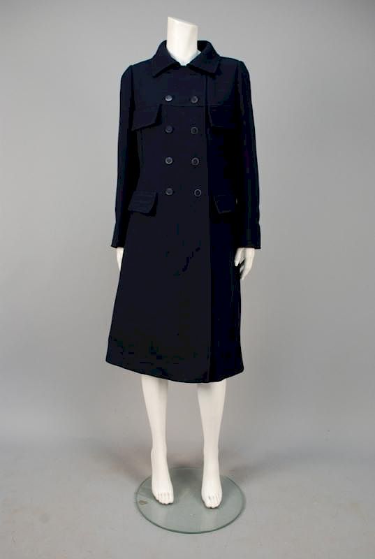 Appraisal: COURREGES PARIS NUMBERED WOOL COAT s Navy blue double breasted