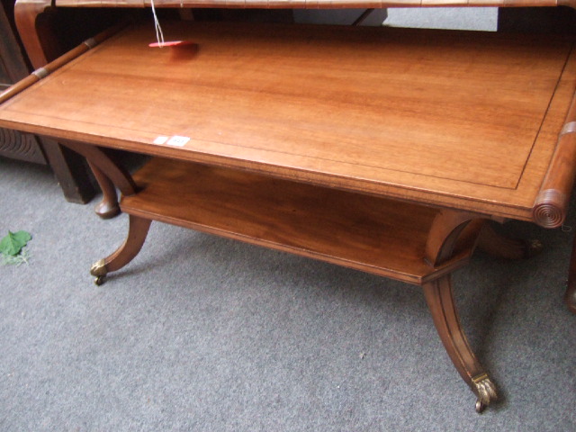 Appraisal: A Regency design mahogany coffee table the rectangular top with