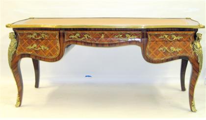 Appraisal: Louis XV style gilt metal mounted bureau plat The shaped