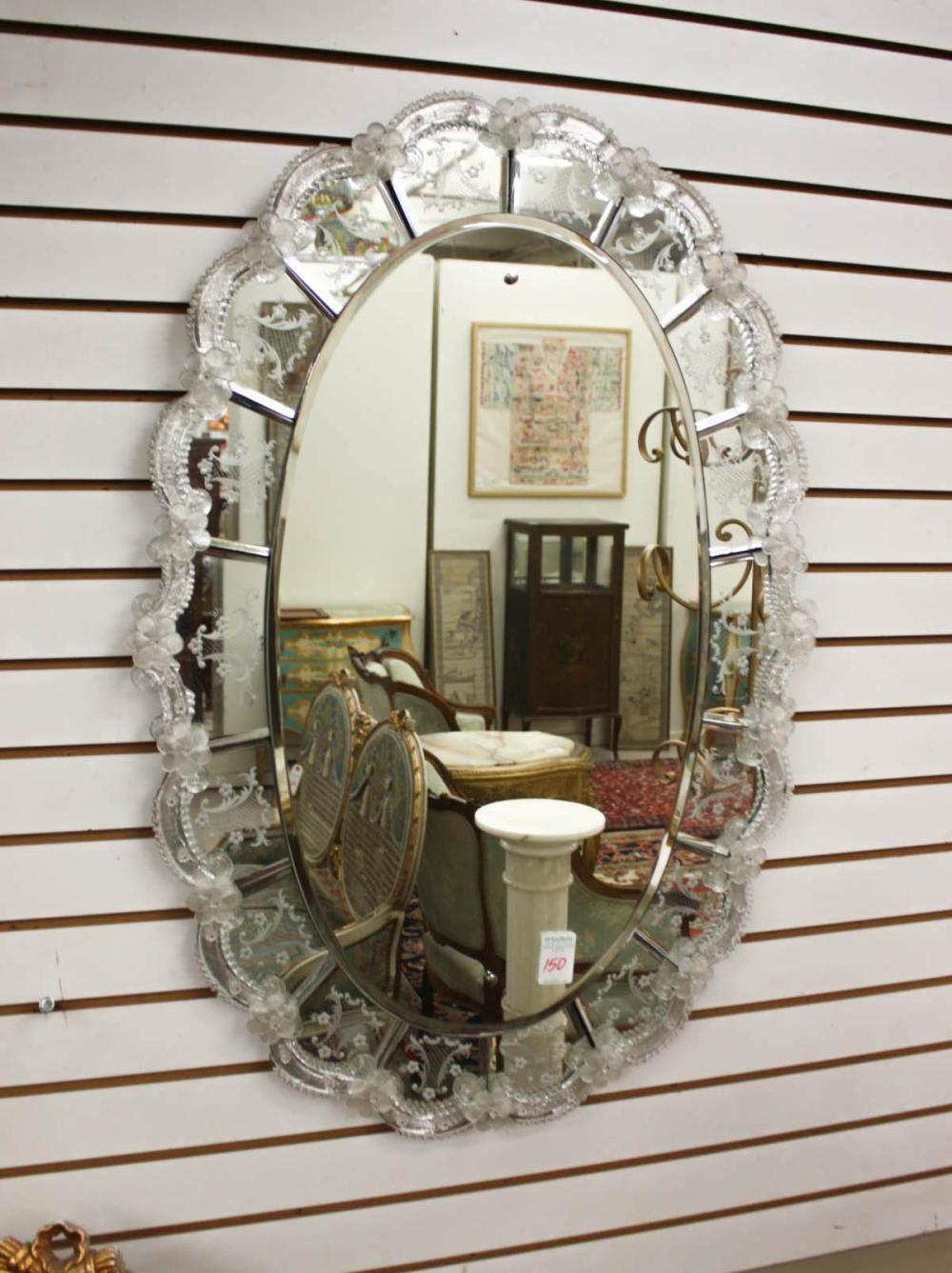 Appraisal: OVAL VENETIAN WALL MIRROR in reverse etched mirror panel frame