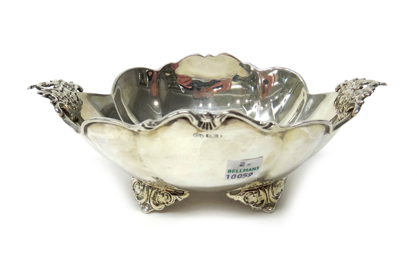 Appraisal: An Italian silver twin handled bowl of shaped oval form