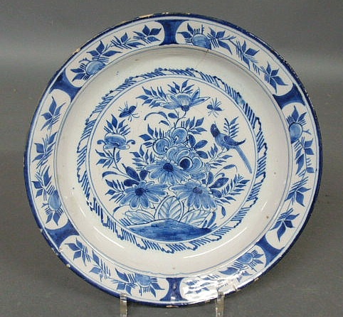 Appraisal: Delft blue and white deep dish th c with floral