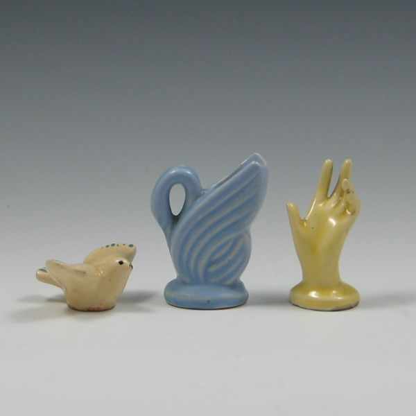 Appraisal: Miniature Bird Pitcher and Hand Figurines bird is unmarked excellent