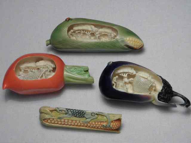 Appraisal: Four Japanese carved ivory vegetables Three have intricately carved internal