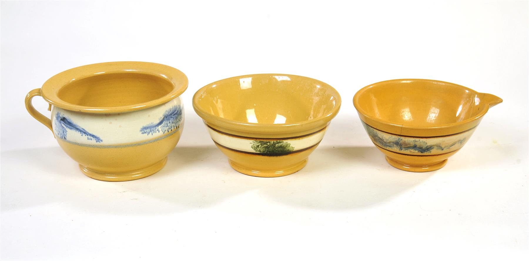 Appraisal: THREE PIECES OF YELLOWWARE American th quarter- th century High