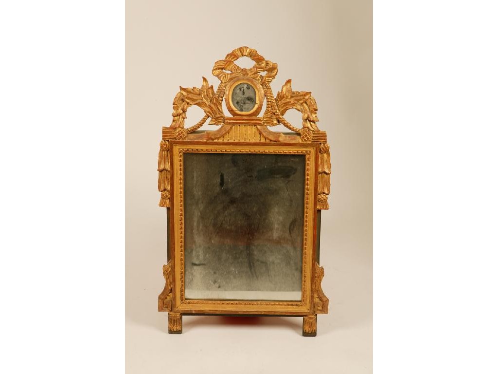 Appraisal: A LOUIS XVI GILTWOOD WALL MIRROR with a rectangular plate