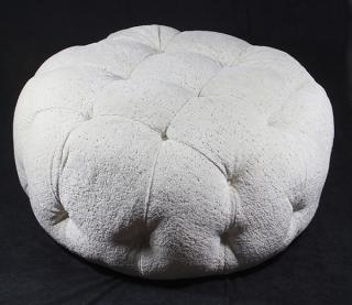 Appraisal: Moderne white upholstered tufted ottoman having a circular form with