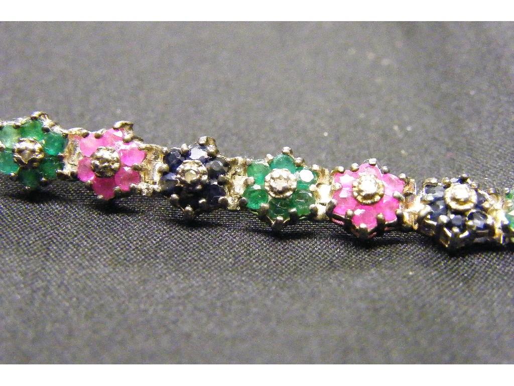 Appraisal: Attractive diamond and gem set floral cluster bracelet in a