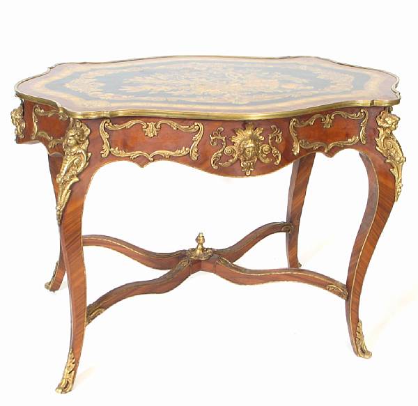 Appraisal: A Louis XV style marquetry inlaid center table height in