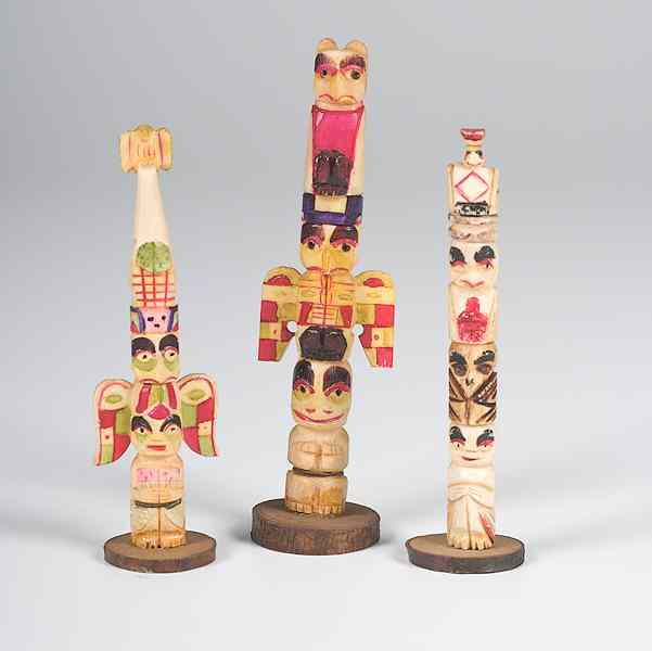 Appraisal: Bone Polychrome Miniature Totems lot of each three figures totems