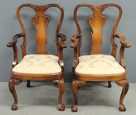 Appraisal: - Pair of Chippendale style mahogany open armchairs with ornately