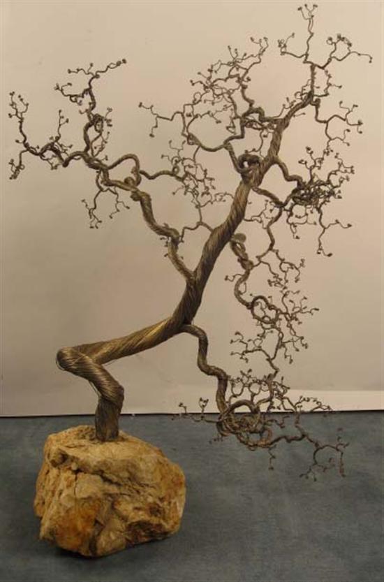 Appraisal: Intricate Intertwined Wire Tree mounted on boulder H