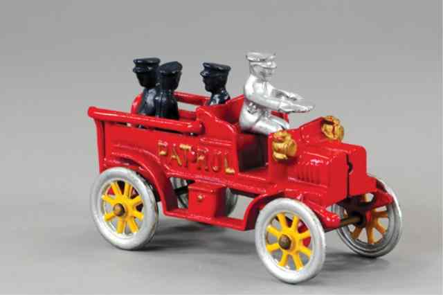 Appraisal: DENT PATROL WAGON Features seated police figures red body silver