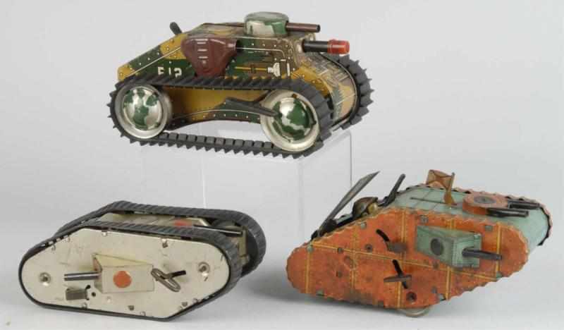 Appraisal: Lot of Tin Litho Marx Tank Wind-Up Toys Description American