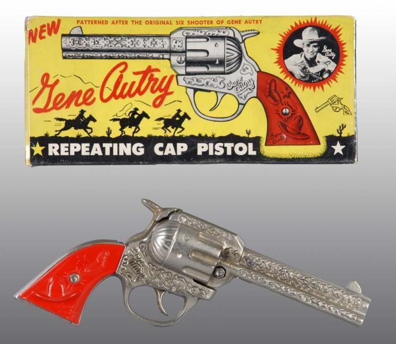 Appraisal: Cast Iron Kenton Gene Autry Long Barrel Cap Gun Description