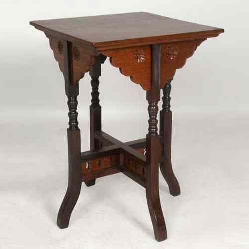 Appraisal: An Anglo Indian Aesthetic Movement Teak and Rosewood Side Table