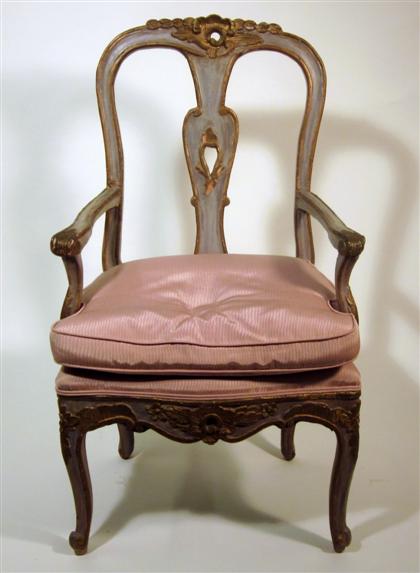 Appraisal: Italian carved painted and parcel gilt armchair th century