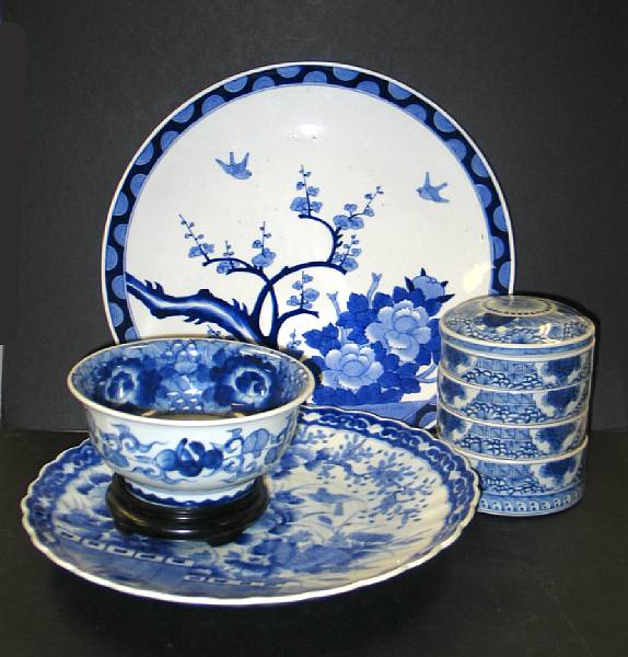 Appraisal: Four blue and white porcelains Including two large chargers one