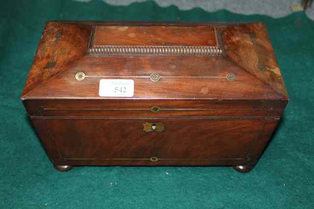 Appraisal: A GEORGIAN MAHOGANY TEA CADDY of sarcophagus form with brass