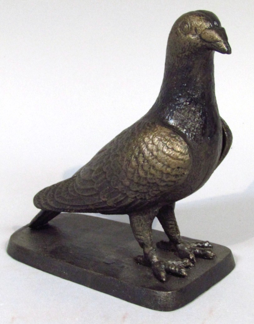 Appraisal: A modern metal figure of a freestanding pigeon cm high