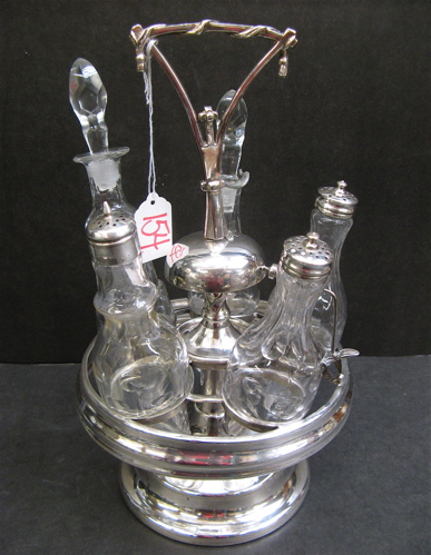 Appraisal: AMERICAN TH CENTURY SILVER PLATED CASTOR SET The revolving stand