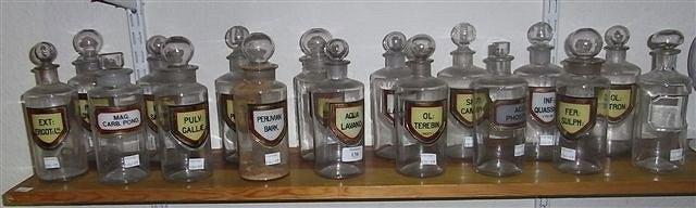 Appraisal: A COLLECTION OF OLD CLEAR GLASS DRUG JARS to include