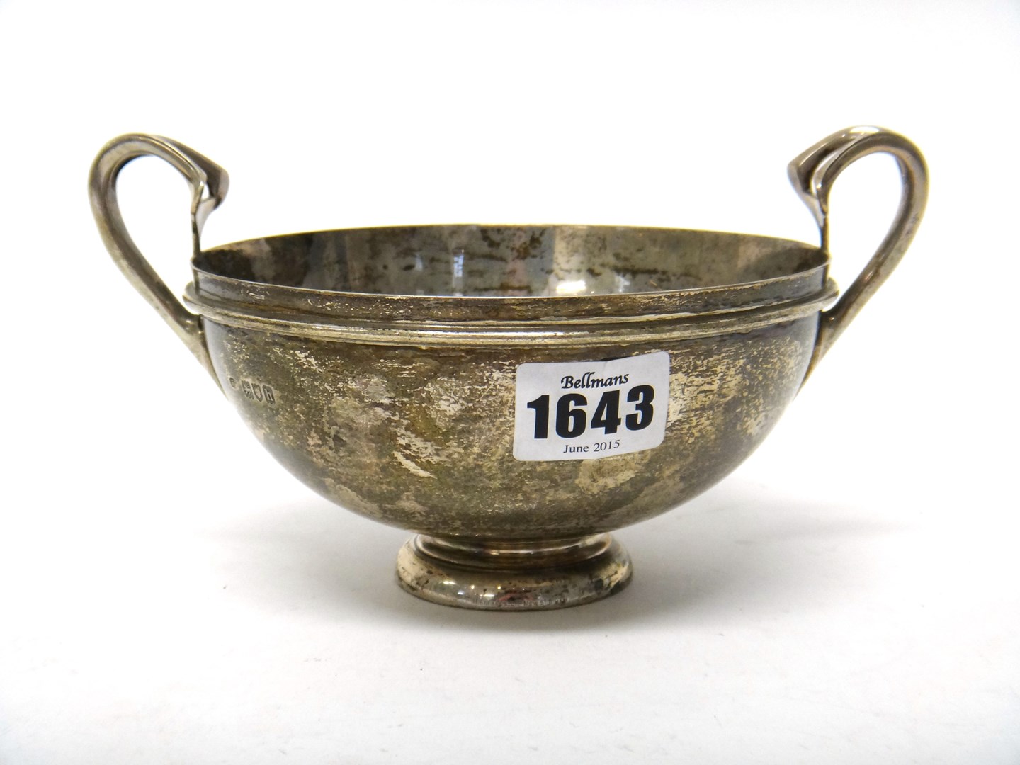 Appraisal: A silver twin handled bowl the handles with pierced Art