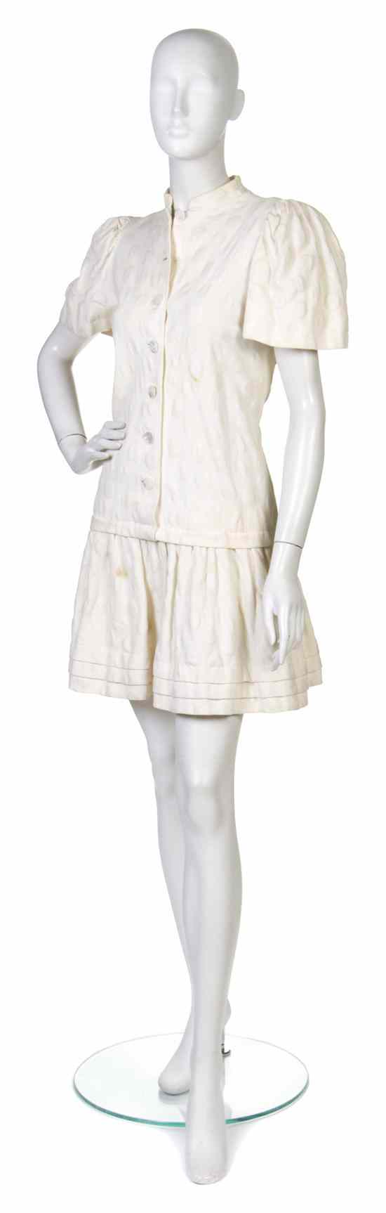 Appraisal: A Pauline Trigere Girl's Cream Cotton Dress with tonal polka