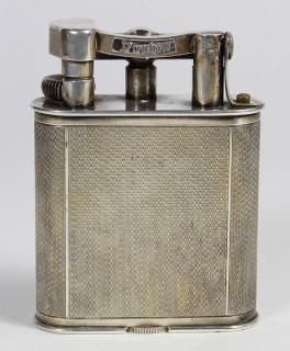 Appraisal: English Dunhill silver plate table lighter having an engine turned