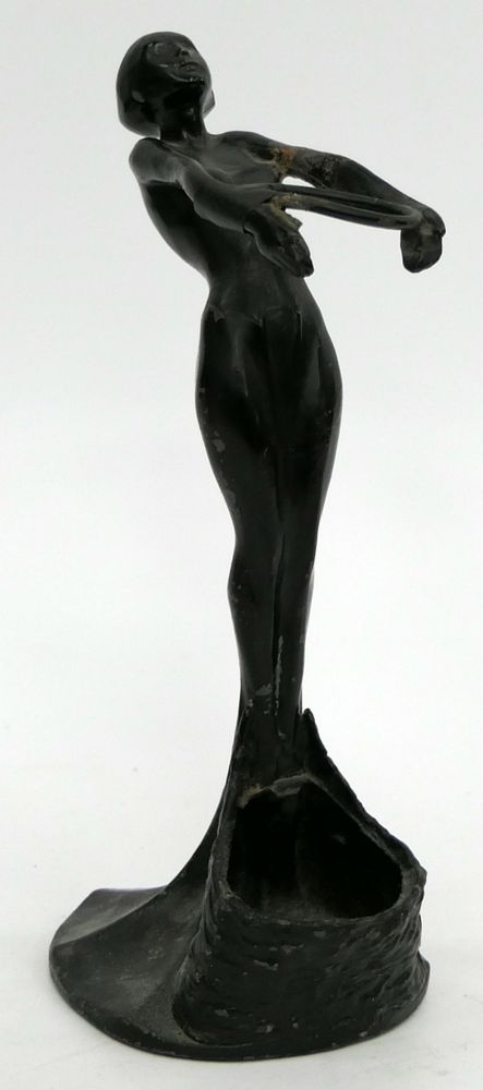 Appraisal: ART DECO METAL NUDE HOLDER In the manner of Frank