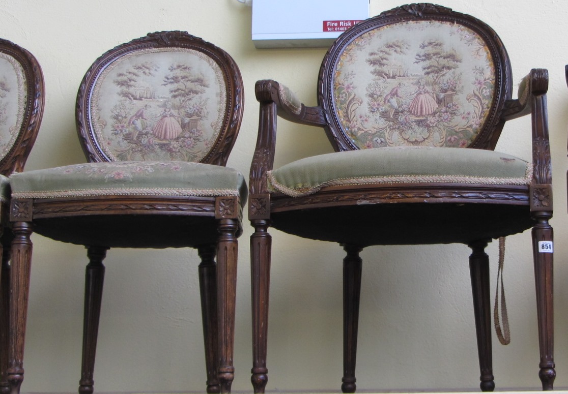 Appraisal: A Louis XVI style beech framed salon suite to include