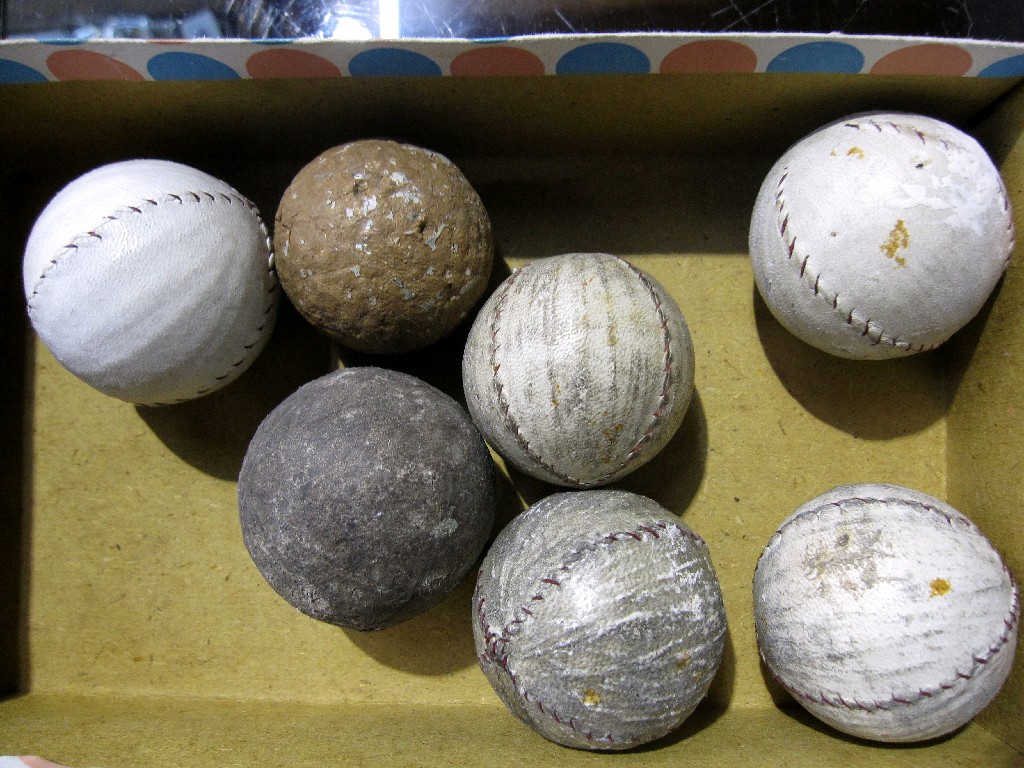 Appraisal: Lot comprising seven old golf balls