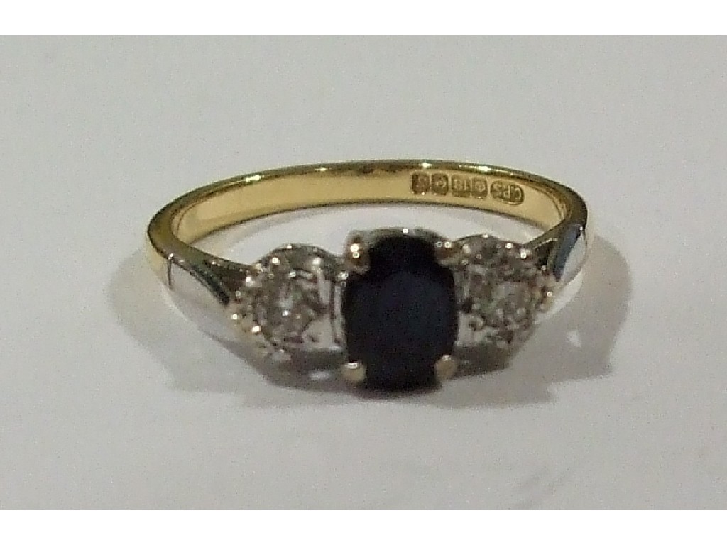 Appraisal: Eighteen carat gold sapphire and diamond three stone ring