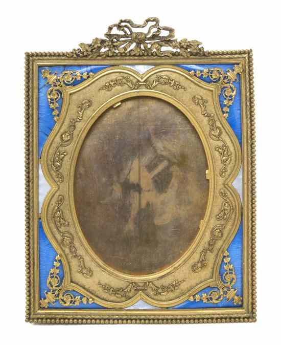 Appraisal: A French Gilt Bronze and Guilloche Enameled Frame of rectangular