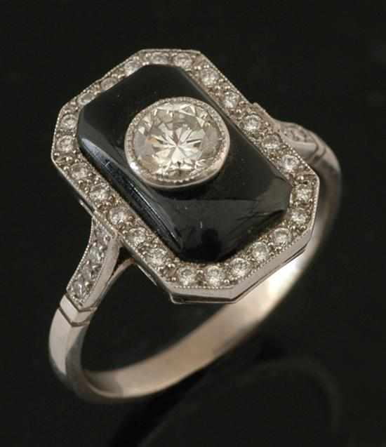 Appraisal: An Art Deco style diamond and onyx plaque ring The