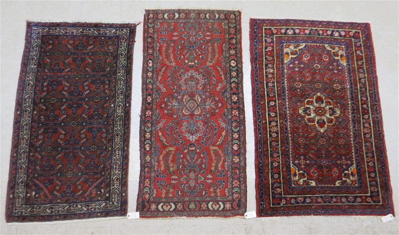 Appraisal: THREE SEMI-ANTIQUE PERSIAN RED FIELD AREA RUGS all hand knotted