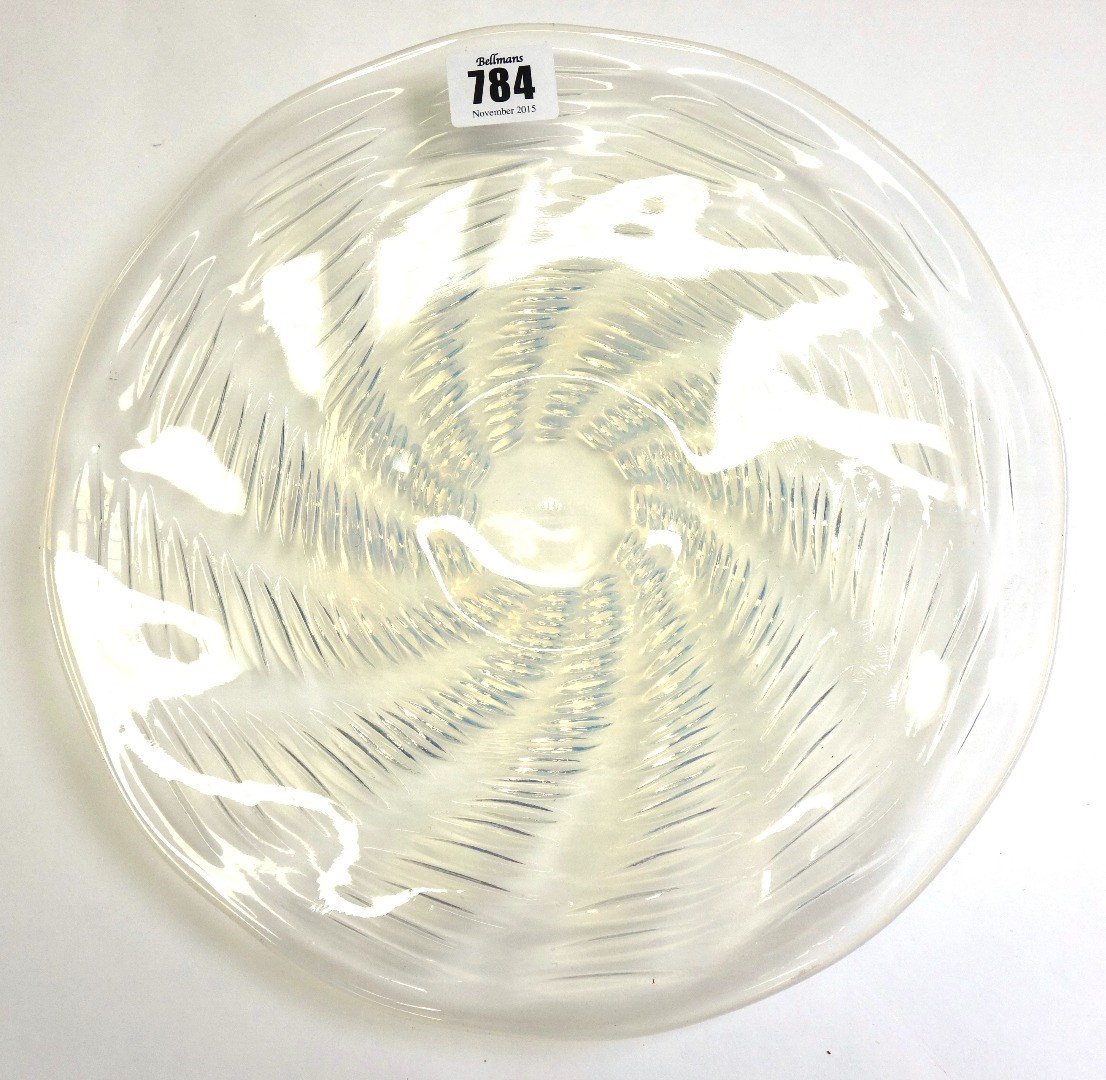 Appraisal: A Lalique 'Ondes' opalescent circular shaped glass plate circa stencil