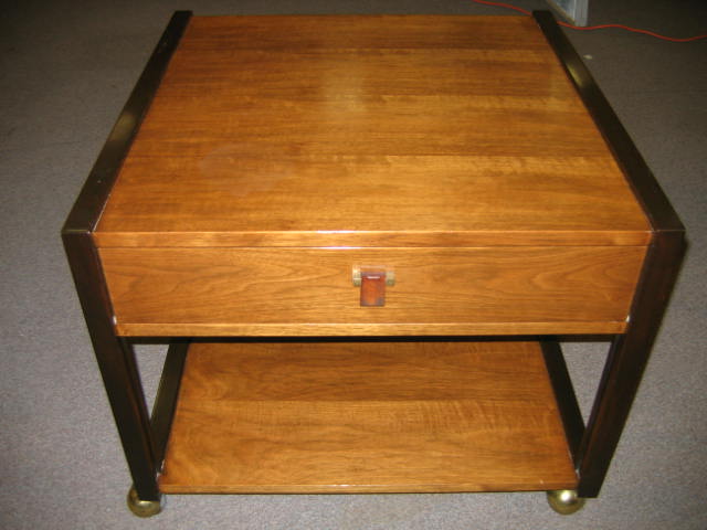 Appraisal: EDWARD WORMLEY FOR DUNBAR Rolling side table walnut and mahogany