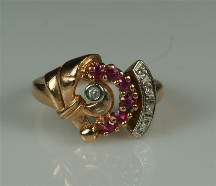 Appraisal: K rose gold diamond and ruby swirl ring size dwt