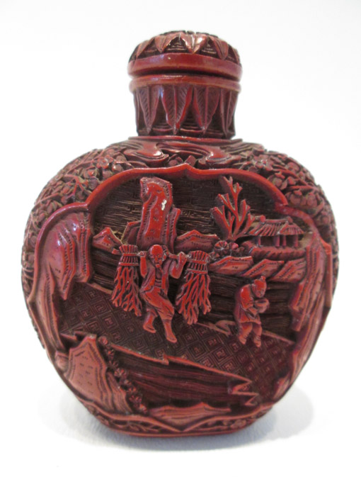 Appraisal: CHINESE CINNABAR STYLE SNUFF BOTTLE flattened form with high shoulders