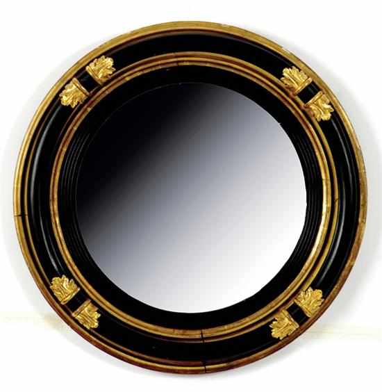 Appraisal: Regency carved giltwood convex mirror early th century molded giltwood