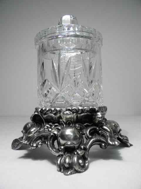 Appraisal: Silverplate and cut crystal rococo style biscuit jar by the