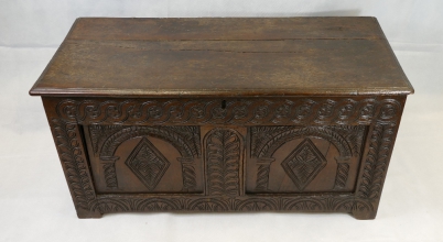 Appraisal: Early Georgian oak paneled coffer with two carved panels length