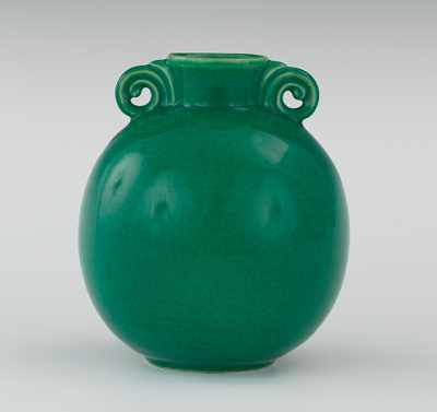 Appraisal: A Cowan Pottery Green Glazed Vase The orb-shape vase has