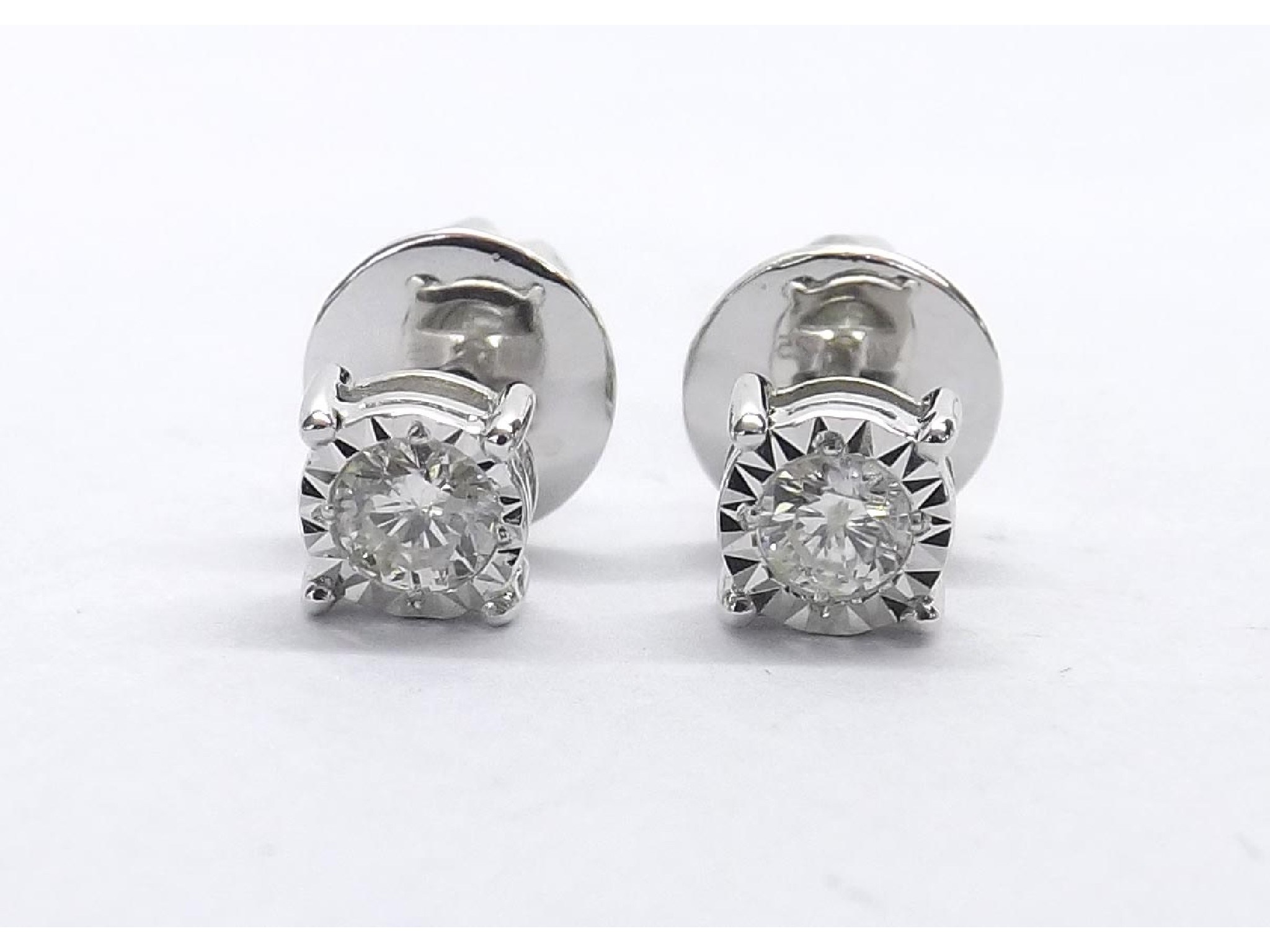 Appraisal: Pair of white gold diamond ear studs round brilliant-cuts estimated