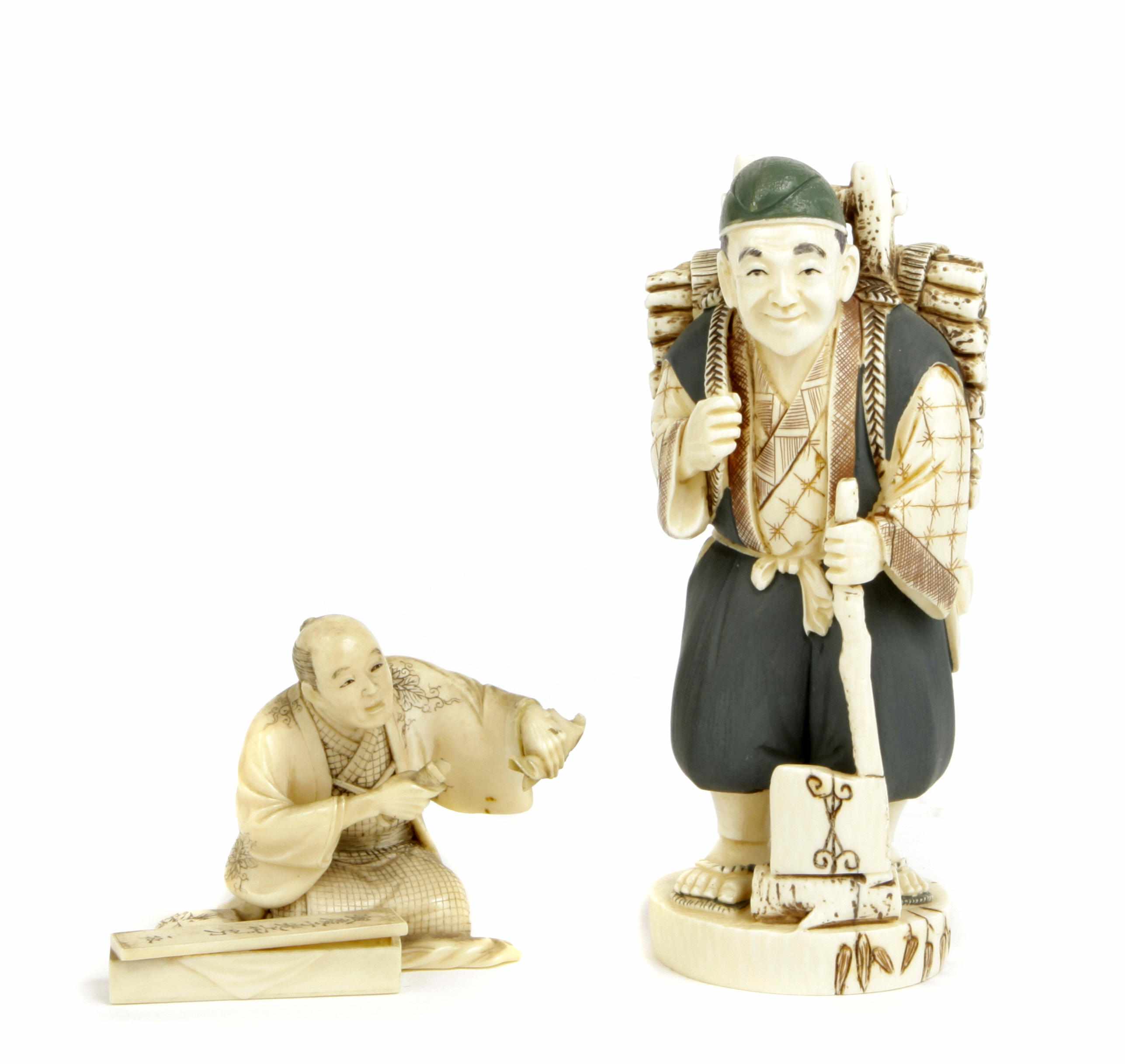 Appraisal: Asian Works of Art A pair of Japanese ivory figures