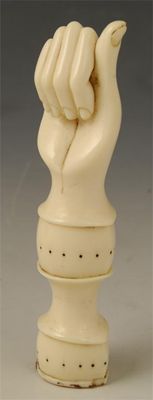 Appraisal: A th century French carved ivory seal modelled as a