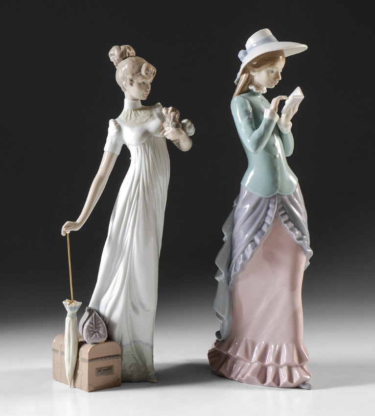 Appraisal: TWO LLADRO PORCELAIN FIGURINES READING Francisco Catala sculptor issued retired