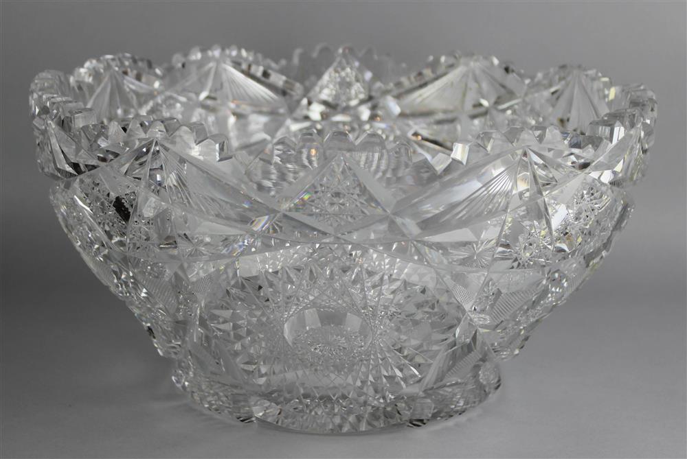 Appraisal: LARGE CUT GLASS PUNCH BOWL apparently unsigned with wavy sawtooth