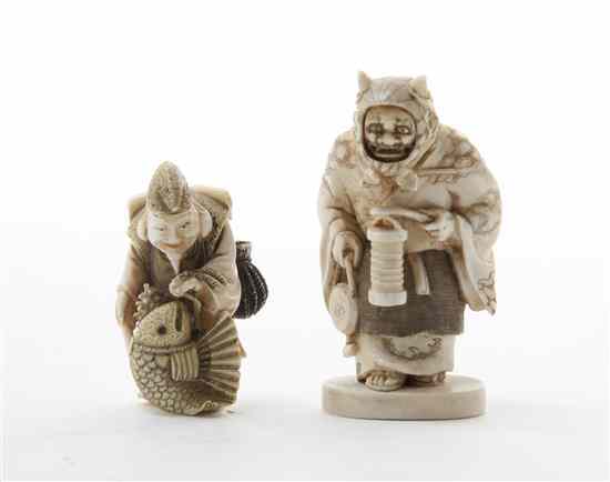 Appraisal: Two Japanese Ivory Netsuke of traditional form Height of tallest